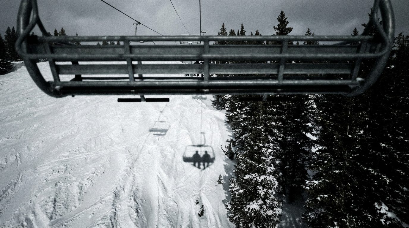 Looking down from a chairlift at the drop below